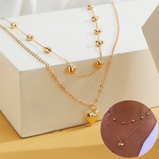 Captivating Layers: The Double-Heart Pendant Necklace